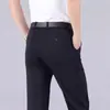 Pantalones de pierna recta versátiles de corte slim negro para negocios, nuevo estilo primavera/otoño, maduros y elegantes, con caída, elásticos en cuatro direcciones, adecuados para padres de mediana edad