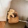 Nova bolsa feminina de outono transfronteiriça, bolsa de mão de bolinhas estilo coreano 2026, bolsa de ombro de urso fofo, bolsa transversal de bolinho