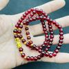 Al por mayor alta imitación granate vino tinto multi-círculo accesorios dorados Pi pulsera de dama cuentas de Buda hombres y mujeres pequeños regalos