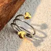 Moda Europea y Americana Nuevos Anillos de Acero Inoxidable, Combinación de Colores Dorado y Plateado Joyería de Acero de Titanio, Diseño de Lujo de Nicho, Anillos Transfronterizos