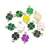 Nuevo color trébol trébol de cuatro hojas gota de aceite accesorios DIY accesorios para joyería llavero colgante para teléfono móvil venta al por mayor
