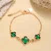 Pulsera de Trébol de Cuatro Hojas Doble Cara al por Mayor para Mujer, Diseño de Flor con Circonita Chapado en Cobre Dorado, Pulsera de Moda de Lujo Ligero Más Vendida