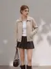 Cárdigan de punto con solapa de cremallera estilo retro para mujer, otoño/invierno 2026 nuevo abrigo suéter gris suave elegante estilo coreano