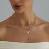 Accesorios transfronterizos europeos y americanos: Collar de corazón con textura de cadena minimalista vintage, collar de borlas versátil de nicho moderno para mujer