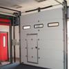Puerta corredera industrial grande insonorizada se puede abrir puerta pequeña control remoto antirrobo elevación vertical reducción de ruido eficiente Ingeniería Especial