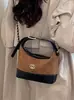 Yuezizhi 2026 principios de otoño nueva moda bolso versátil bolsa para lonchera bolso de cadena estilo vintage bolso cruzado tipo cubo esmerilado