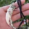 Collar de diente de lobo para hombre, colgante de diente de perro negro genuino, retro, dominante, accesorios de ropa personalizados, joyería de moda simple, moda
