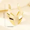 Pendientes Metálicos Retro Exagerados Europeos y Americanos Cruzados de Metal Lava Plisados en L Pendientes de Línea Asimétrica de Moda para Mujer
