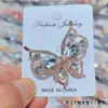 Nueva Moda Elegante Joyería de Cristal Broche de Mariposa Lujo Ligero de Alta Calidad Corsage Atmosférico Accesorios de Pasador Antideslizante