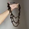 Collar multicapa de estilo étnico vintage con cuentas y concha de coco para mujer, diseño único con un temperamento de alta gama, accesorio de cadena para la clavícula versátil