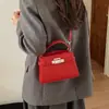 Bolso de Mano Pequeño Elegante de Gama Alta para Mujer 2026 Nuevo Bolso Cruzado Versátil Bolso Tote Pequeño Kelly Super Popular de Moda