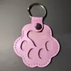 Chaveiro de Couro Criativo Pingente Armazenador de Pelos de Pet Cão e Gato Exquisito Fofo Charme para Bolsa