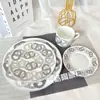 Estilo Europeo Transfronterizo Simple Moderno Fresco Hueso de China Plata Pista Plato para Comida Occidental Taza y Platillo Decoración para Filete Decoración de Mesa