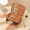 Bolsa de almacenamiento para artículos de tocador y herramientas de maquillaje con separadores, bolso de mano portátil de tela Oxford elegante para viajes