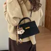 Bolso Kelly Retro de Nicho para Mujer 2026 Nuevo Bolso de Mano Versátil de Moda Cuadrado Pequeño Bolso de Hombro Cruzado Elegante