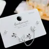 Aguja de plata s925 cadena simple personalizada términos tres pares de aretes estilo coreano simple para ir al trabajo un tarjetero aretes multipar para mujer