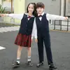 Uniforme escolar de Shenzhen uniforme de cuatro piezas camisa de invierno suéter uniforme de clase de escuela primaria uniforme de escuela primaria de Shenzhen una generación de pelo