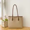Bolsa de Mão Texturizada para Comutador Transfronteiriço 2026 Nova Versátil Estilo Coreano Bolsa de Ombro Único Sob o Braço Bolsa Tote Elegante