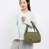 Bolso de mujer de moda transfronterizo, bolso simple estilo japonés tipo albóndiga, bolso de hombro versátil de color sólido para mujer, bolso cruzado nuevo de gran capacidad, moderno