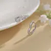 Corea del Sur Amor Zircón Hebilla de Oreja Simple Moda Celebridad de Internet Personalizado Fila Hueca Pendientes de Diamante Diseño de Lujo Ligero Aro de Oreja con Forma de Corazón