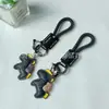 Hazte Rico en la Cuerda Trenzada de Cuero para Caballo Llavero de Coche Pareja Cuero Dibujo Animado Caballo Colgante Exquisito Colgante de Bolso Regalo