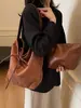 Bolso para Axila de Viaje Diario para Mujer 2026 Nuevo Estilo Coreano de Moda Bolso Cubo Retro Bolso Cruzado Urbano Simple