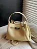Bolsa de mão estilosa super popular transfronteiriça feminina 2026 novo estilo bolsa balde para trabalho e trajeto alto valor de aparência linda bolsa transversal