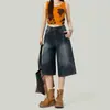 Elegantes y estilizados jeans cropped de estilo americano, un nuevo diseño para ropa de trabajo, con un corte retro y versátil de cintura alta y pierna ancha