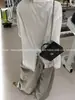 "Esencial para Capas Sutiles" Diseño de Nicho Camiseta Blanca Holgada de Manga Larga con Abertura Trasera y Paneles de Encaje