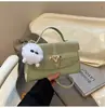Bolso Pequeño Cuadrado de Moda y Tendencia Bolso Cruzado de Hombro para Mujer Primavera 2026 Diseño de Nicho Casual Nuevo Estilo