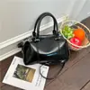 Bolsa de Almofada Prata de Luxo para Mulheres 2026 Bolsa de Mão Brilhante Bolsa de Ombro Transversal Design de Nicho Versátil para o Dia a Dia