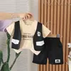 Nuevo Conjunto de Dos Piezas para Niños de Verano, Cuello Redondo, Chaleco Falso de Tres Piezas Estampado de Manga Corta, Pantalones Casuales de Algodón de Cinco Cuartos, Fabricante, Venta al por Mayor