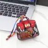 Porta-moedas Mini Tendência Estampado em Forma de Casa, Versátil e na Moda, Bolsa Pequena Portátil para Fone de Ouvido e Moedas, Com Pingente