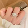 Anillo de Lujo Ligero Imitación Moissanita Corte Marquesa con Alrededor en Forma de Huevo de Paloma, Moda Europea y Americana Super Brillante de Alto Carbono