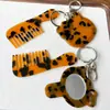 Peine espejo en forma de corazón, colgante de peine de acetato, accesorio de bolso simple y versátil, peine portátil con mango, llavero
