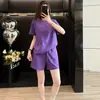 Conjunto de dos piezas morado de estilo deportivo casual para mujer, verano 2026, de manga corta y shorts, holgado y moderno, conjunto para correr que rejuvenece