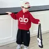 Conjunto Fresco para Niño Estilo Primavera y Otoño Chaqueta Infantil Sudadera con Capucha Conjunto de Tres Piezas 2026 Modelo Nuevo Ropa Deportiva para Niños