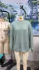Amazon Europa América Comercio Electrónico Transfronterizo 2026 Otoño Invierno Nuevo Color Sólido Cuello Medio Alto Holgado Manga Larga Camiseta Superior Mujer