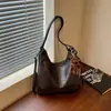 Bolso minimalista retro transfronterizo 2026 nuevo bolso de hombro para mujer, bolso tote cruzado de moda para el trabajo, capacidad grande informal