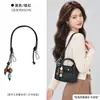 Solo se vende la bolsa interior - la bolsa exterior no está incluidaBolsa mini tipo dumpling Longchamp, Papel Dupont Longchamp