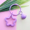 Anillo de Tarjetas de 15 Colores Seleccionados Cuidadosamente Campana Estrella de Cinco Puntas de Colores Flor de Ciruelo de Plástico Llavero de Acrílico Llavero Colgante Dopamina