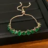 Pulsera extensible ovalada chapada en oro real con incrustaciones de circonita, sensación de lujo ligero de nicho de alta gama, accesorio de mano simple y elegante