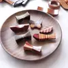 Precio de fábrica al por mayor una variedad de porta palillos creativo soporte de palillos de madera hotel comedor almohadilla para palillos lindos adornos pequeños
