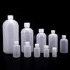 Venta al por mayor 10 20 30 50 60 100 ml botella de plástico translúcida botella para líquidos botella para medicamentos botella de agua botella dividida