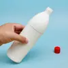 En Stock Polietileno de Alta Densidad 500ml 84 Blanqueador Desinfectante Agua Desinfectante Botella Hogareña Botella de Plástico 84 Desinfectante