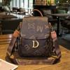Bolso de hombro de marca de moda para mujer 2023 primavera y verano nuevo mochila escolar para estudiante estampado de letras bolso de hombro bolso pequeño al por mayor