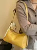 Bolso de mano para mujer Shuai Mi Jia 2026 nuevo de principios de otoño, bolso vintage para hombro o axila, bolso cruzado de alto valor para el día a día