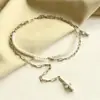 Cadena de cintura de perlas de venta caliente europea y americana para mujer, Accesorios cruzados de diseño de nicho para chica dulce y genial, Joyería de cintura de moda hip-hop