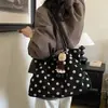 Bolso de mano minimalista de moda estilo coreano 2026 otoño nuevo lunares bolso casual de moda para el trabajo bolso de un solo hombro debajo del brazo