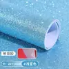 Materiales: Papel de espuma con lentejuelas, papel esponja, EVA con polvo de oro, papel con brillantina para kínder, hojas grandes de papel reflectante brillantes, manualidades para hacer tú mismo